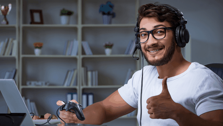 happy guy playing PC game