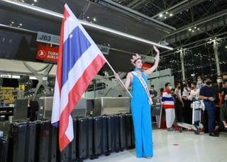 Miss Universe Thailand Anchilee Scott-Kemmis is accused of standing on the national flag