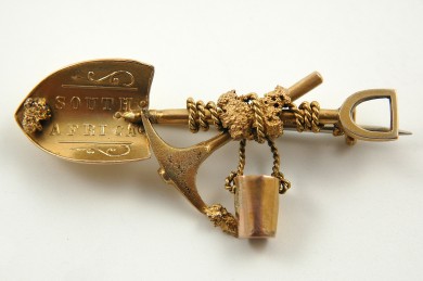 South African gold brooch