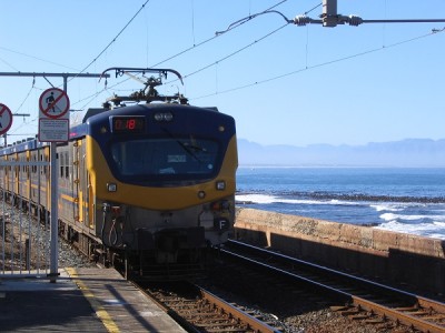 Metrorail train moving along the False Bay coast